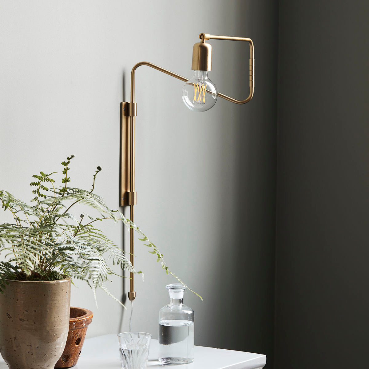 Wandlampe Swing - messing klein