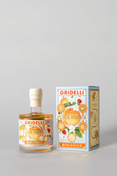 Gridelli Aceto Balsamico Pesca Bianca – Premium Bio-Balsamico mit weißem Pfirsich stilvoll präsentiert