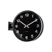 Schrägansicht der Karlsson Wanduhr New Classic doppelseitig in Schwarz
